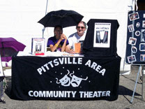 Volunteers work to promote PACT and advertise the upcoming production of "Rumors" in 2005.